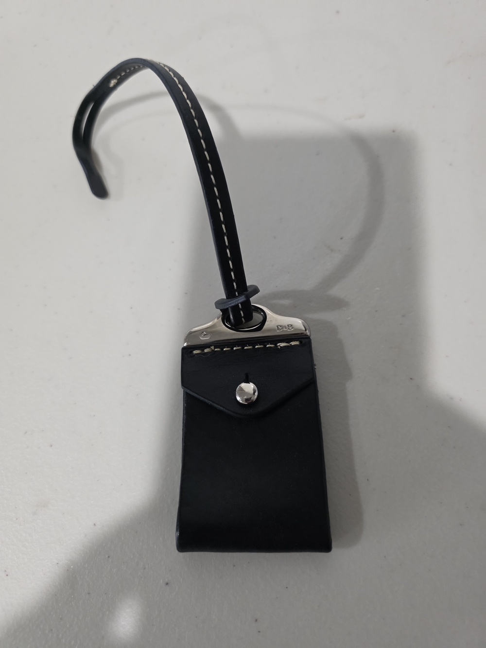 Dooney & Bourke Black Leather Bag Charm Hangtag